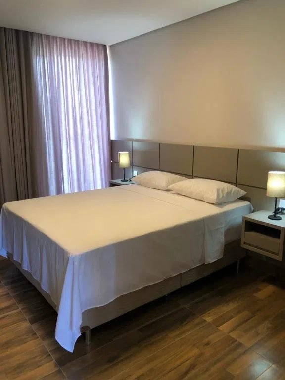Quarto duplo com cama de casal